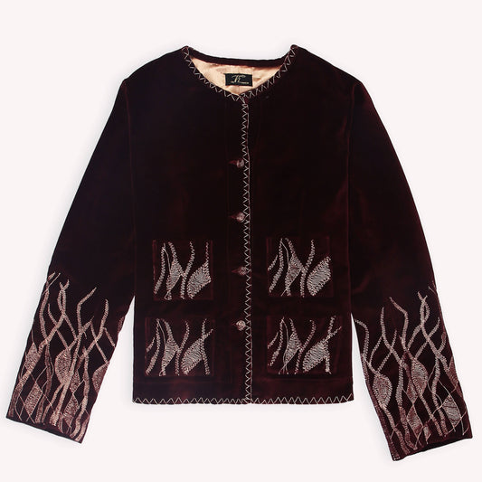 A burgundy women's suede jacket with gold zari embroidery and a front button closure, displayed on a white background.