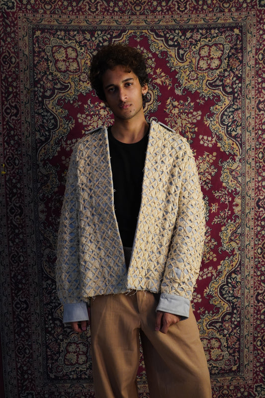 “Hand weaving detailing beige cotton denim Hunter jacket”
“Beige unisex cotton denim coach jacket with hand woven design”