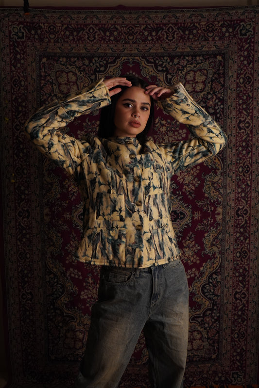 This piece of clothing has been referred to on the Bee as the “Noor women’s 
multicolored fleece wool quilted jacket with warm quilting.” A fashionable fleece quilted 
wool coat in a shocking colorful panels for women