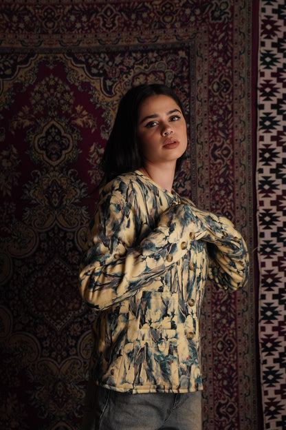 This piece of clothing has been referred to on the Bee as the “Noor women’s 
multicolored fleece wool quilted jacket with warm quilting.” A fashionable fleece quilted 
wool coat in a shocking colorful panels for women