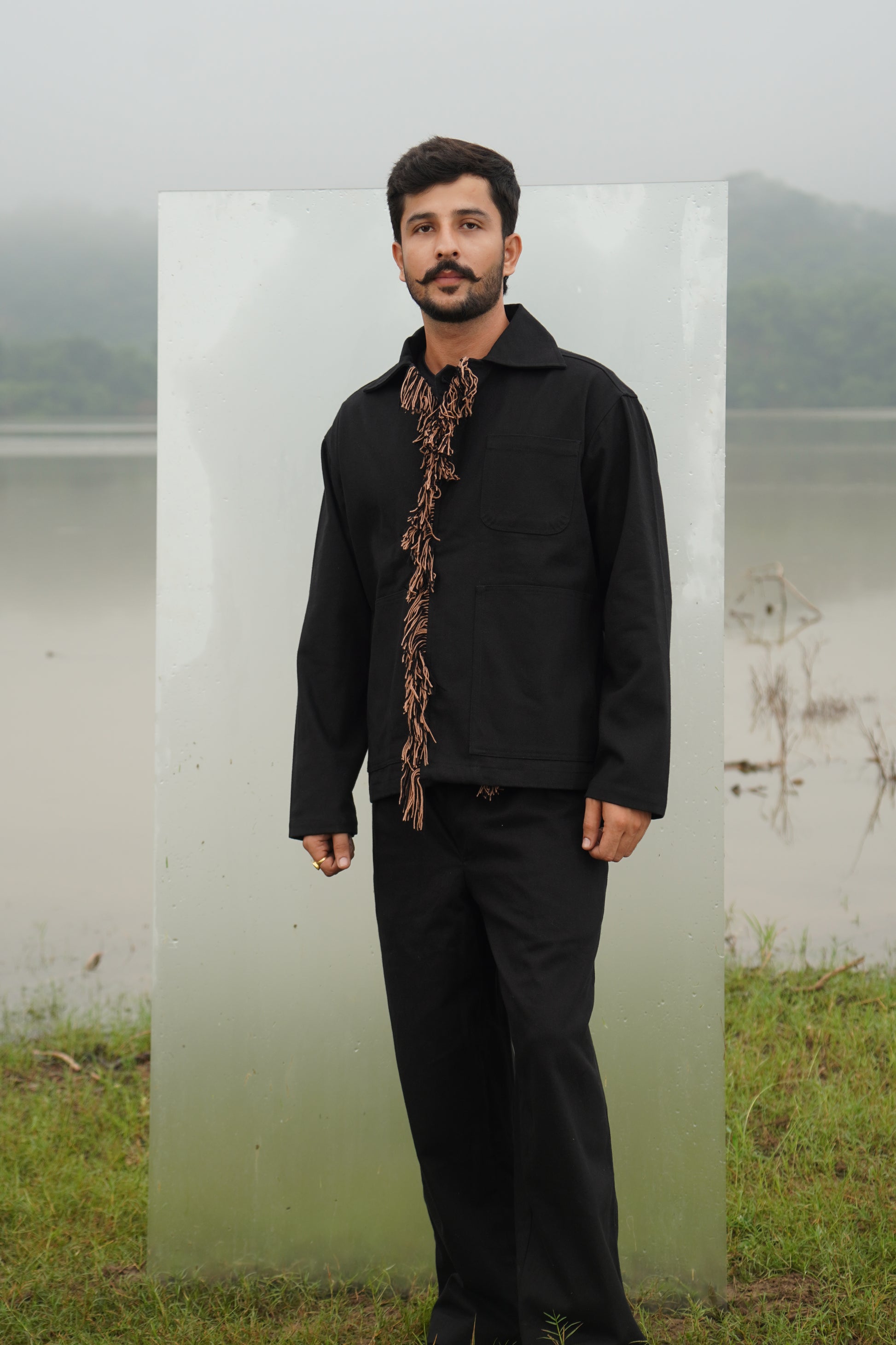 This black Luna unisex denim jacket is embroidered with wool.