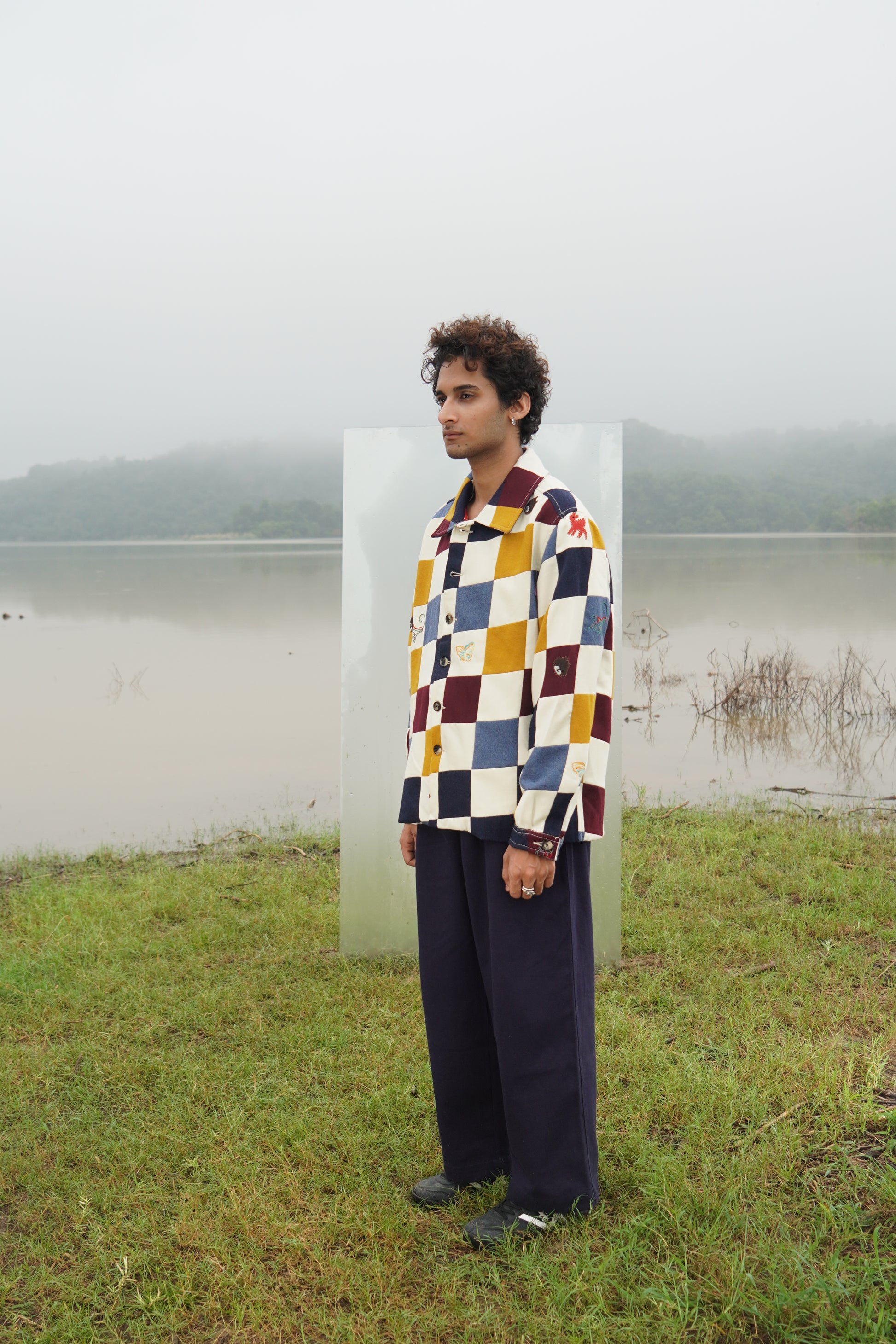 Jackson gender-fluid multicolor patchwork wool shacket with appliqué embroidery 
“Chic unisex patchwork embroidered wool jacket in multicolor panels” 